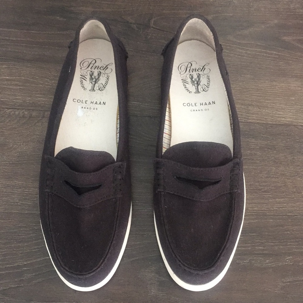 Cole Haan black slip on loafers